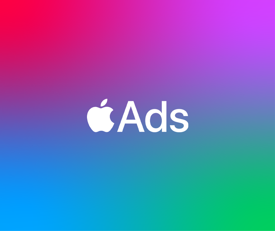 A white version of the Apple Ads logo against a colored gradient background that transitions from red to purple to blue to green.