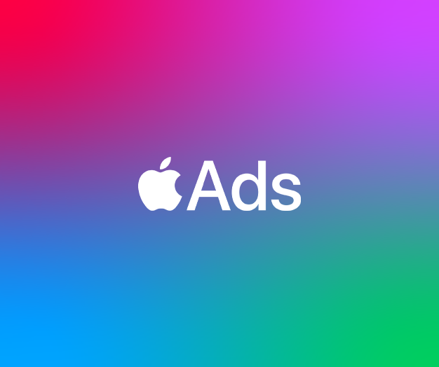 A white version of the Apple Ads logo against a colored gradient background that transitions from red to purple to blue to green.