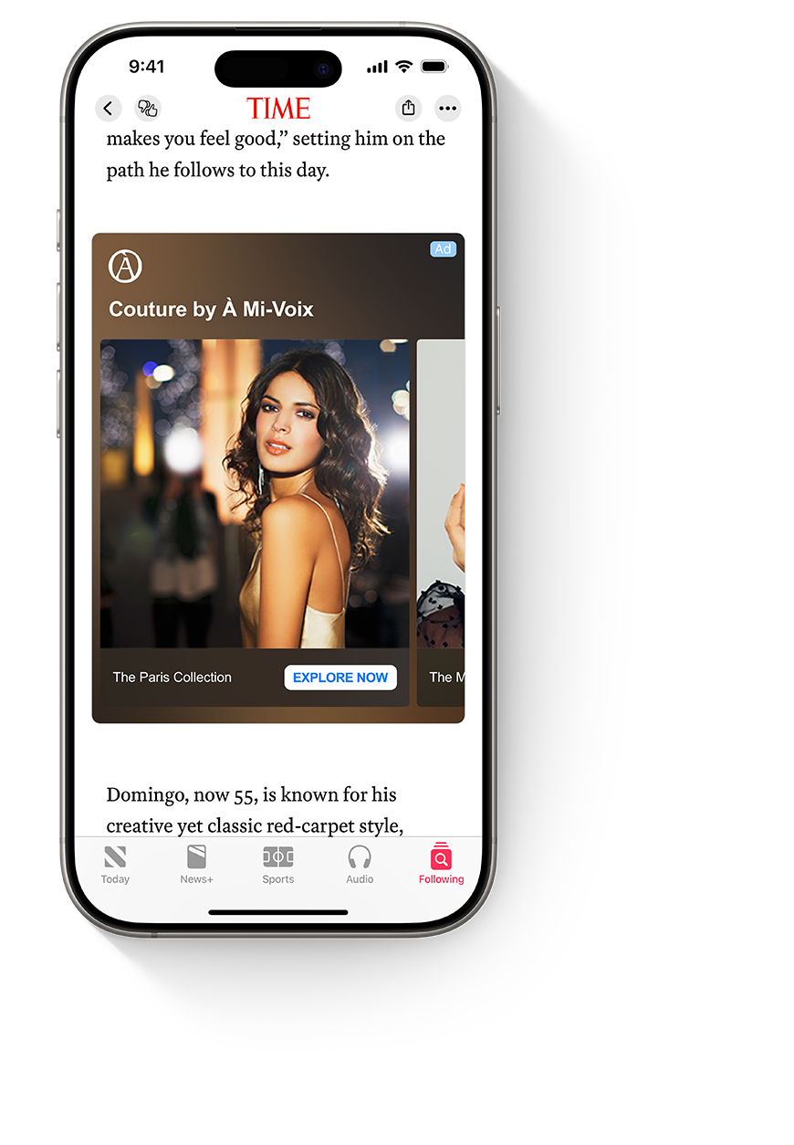 An iPhone with the Apple News app open, showing an ad for Á Mi-Voix within a People article.